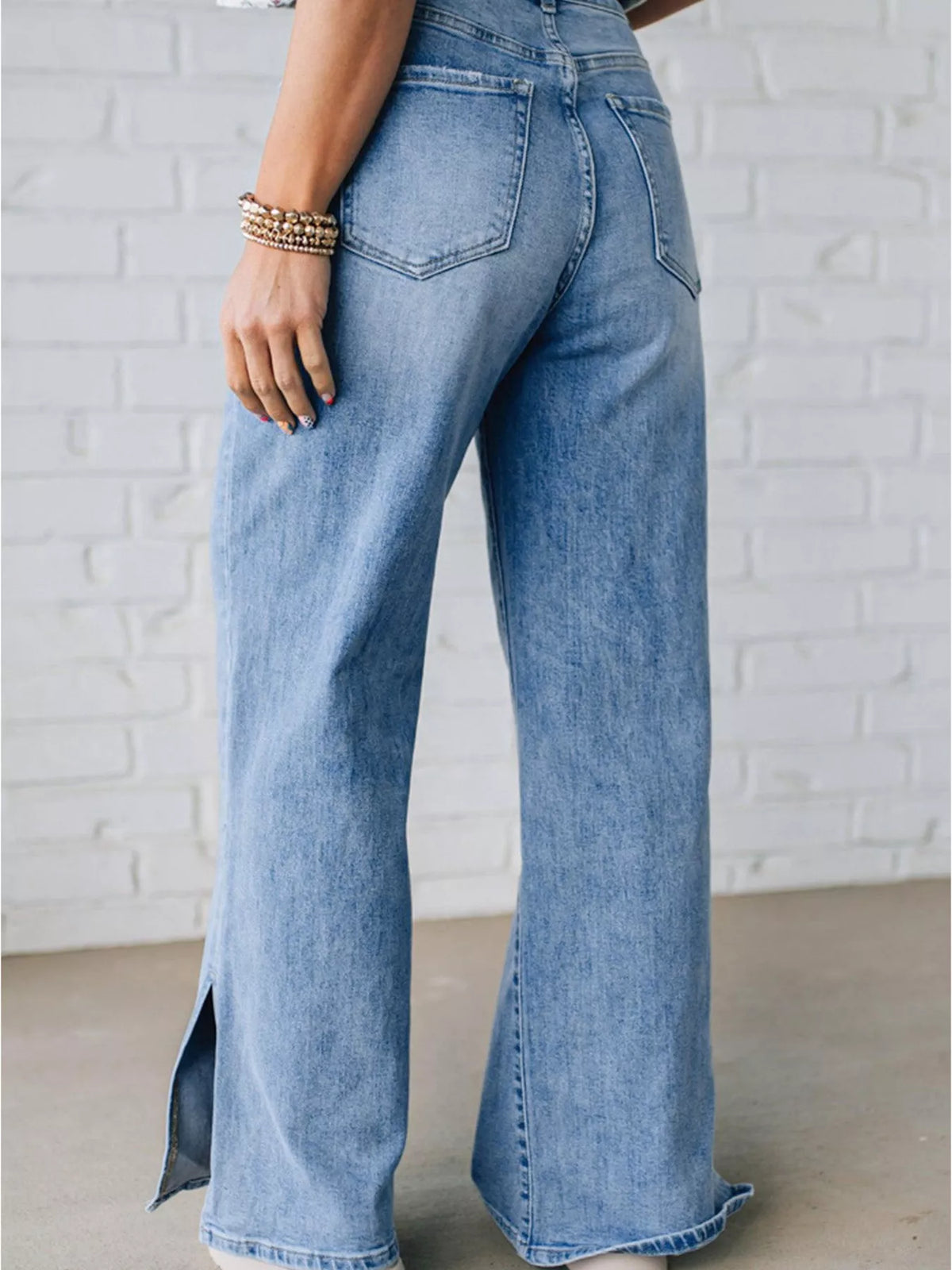 Drawstring waist detail on wide leg jeans