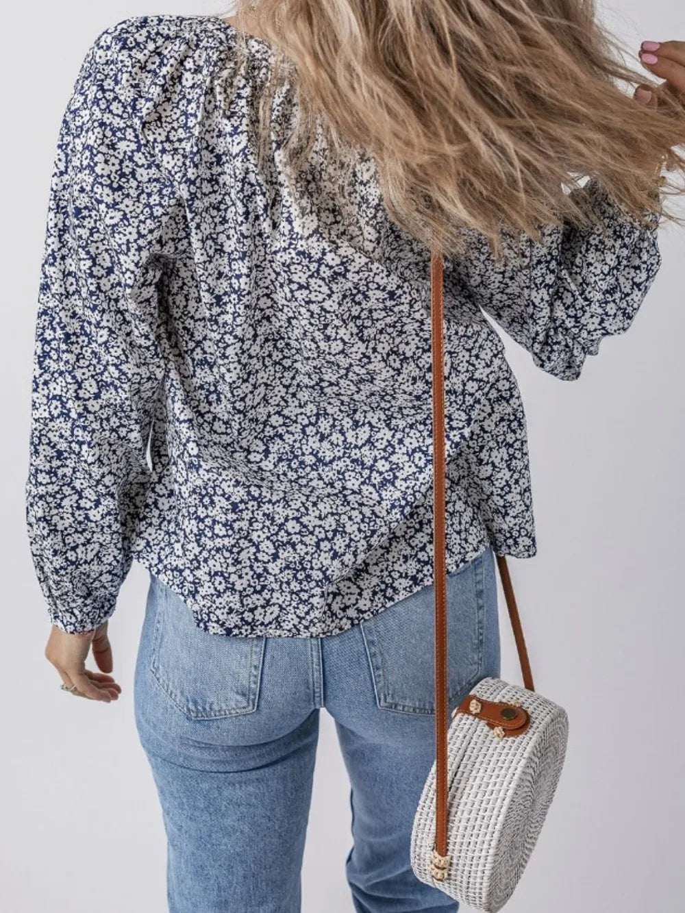 Floral print long sleeve blouse angled view