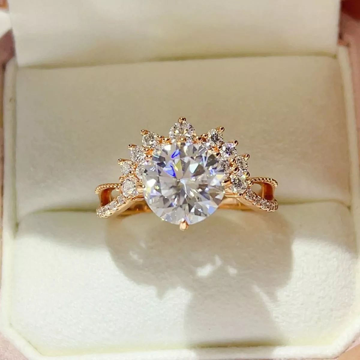 Starglow 3 carat moissanite ring in gold shown on a hand