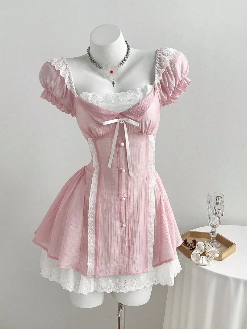 Pink lace detail cap sleeve dress front view