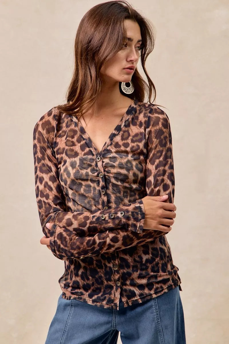 Leopard mesh top V neckline close up