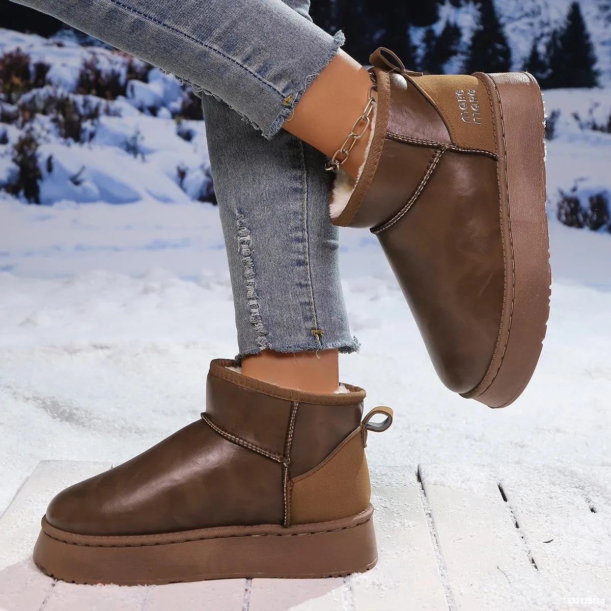 Faux fur platform ankle boots worn with denim
