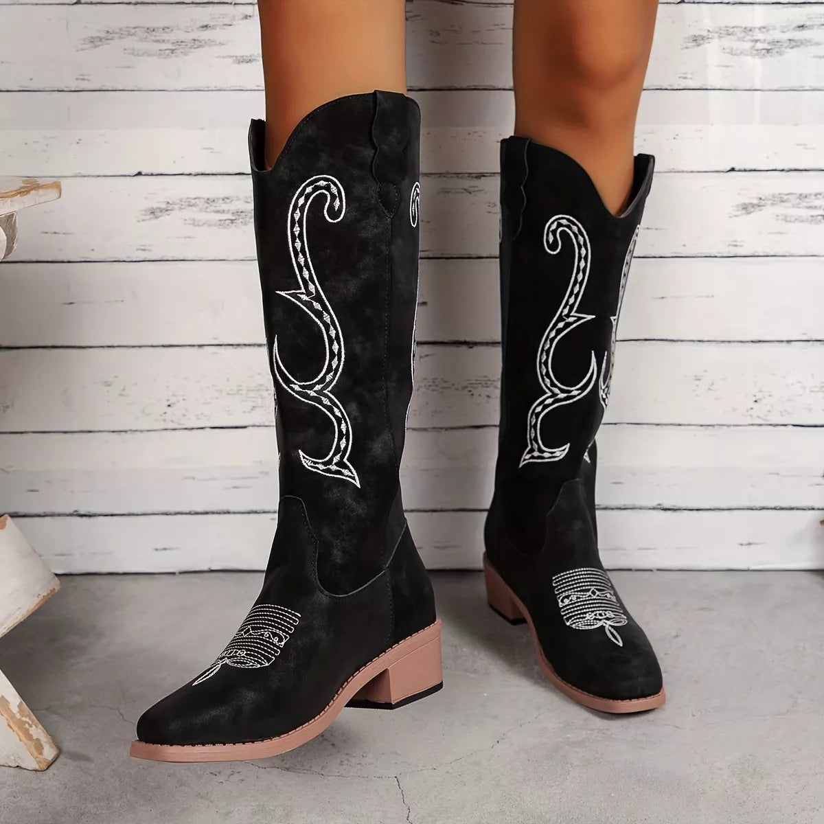 Embroidered round toe block heel boots front view
