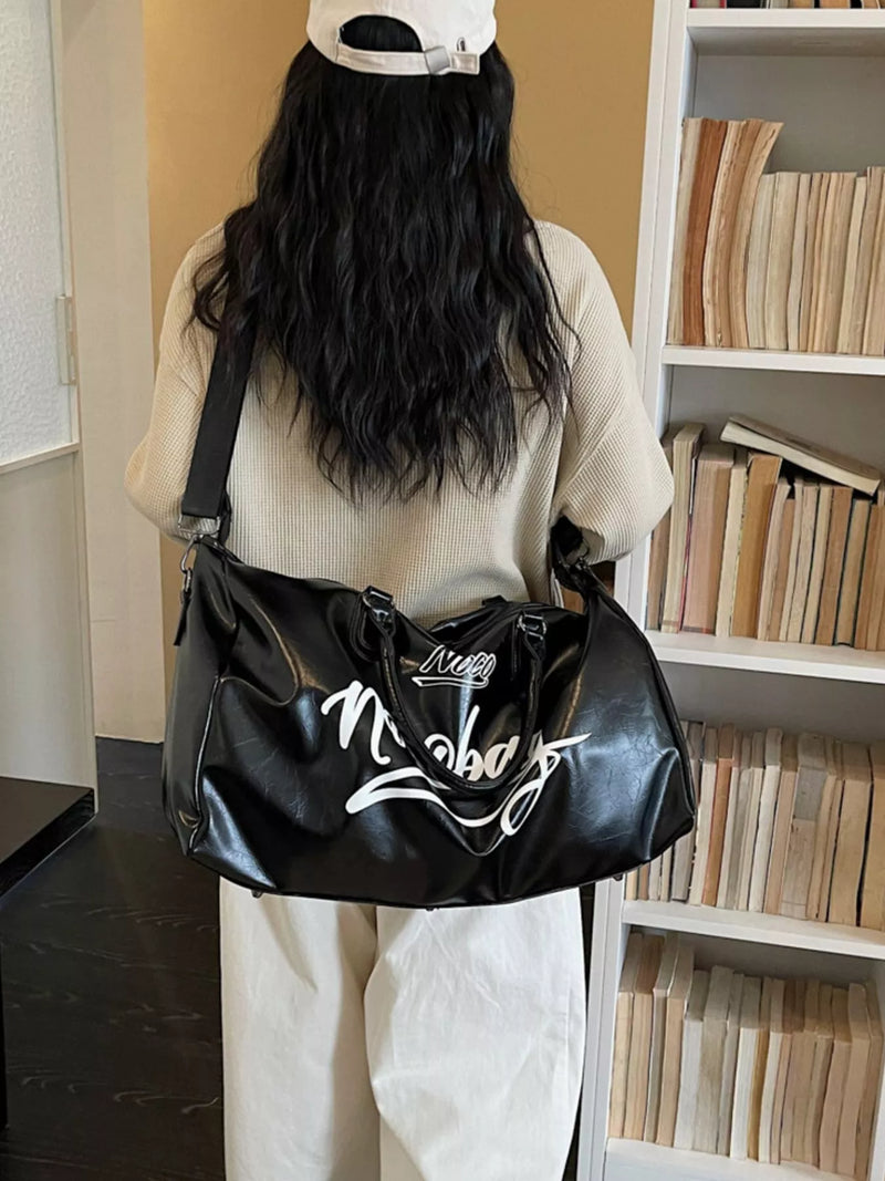 Letter print travel bag front view in black