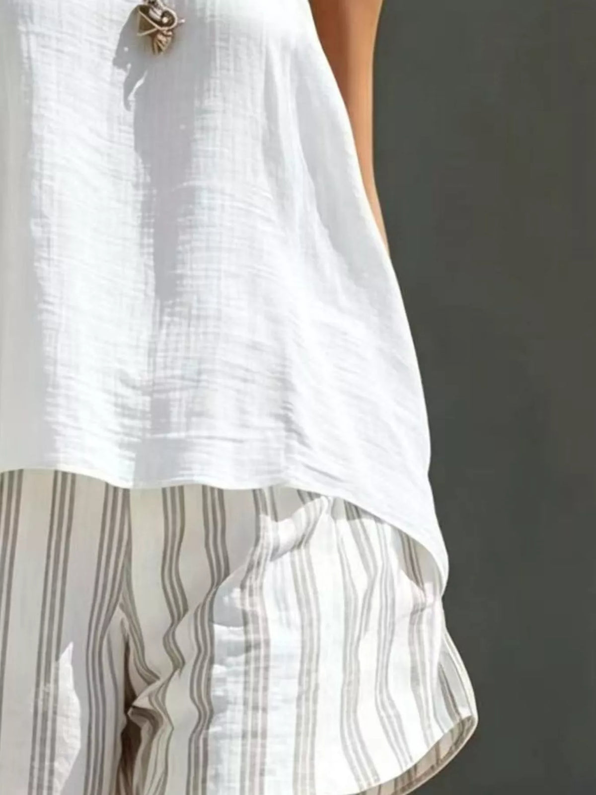 Striped shorts detail on model