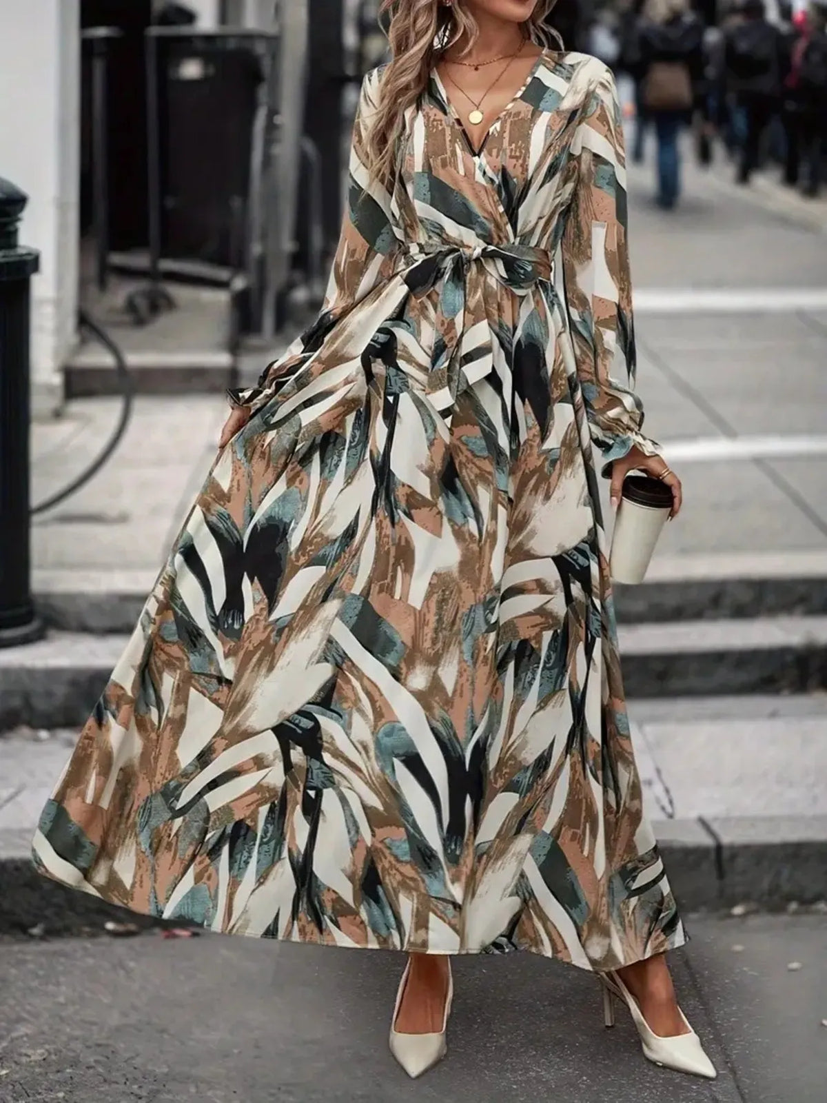 Surplice wrap front and tie belt detail