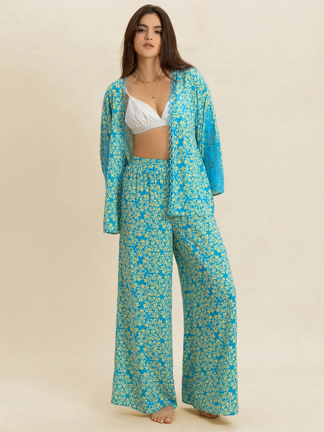 Teal lace trimmed open front top styling