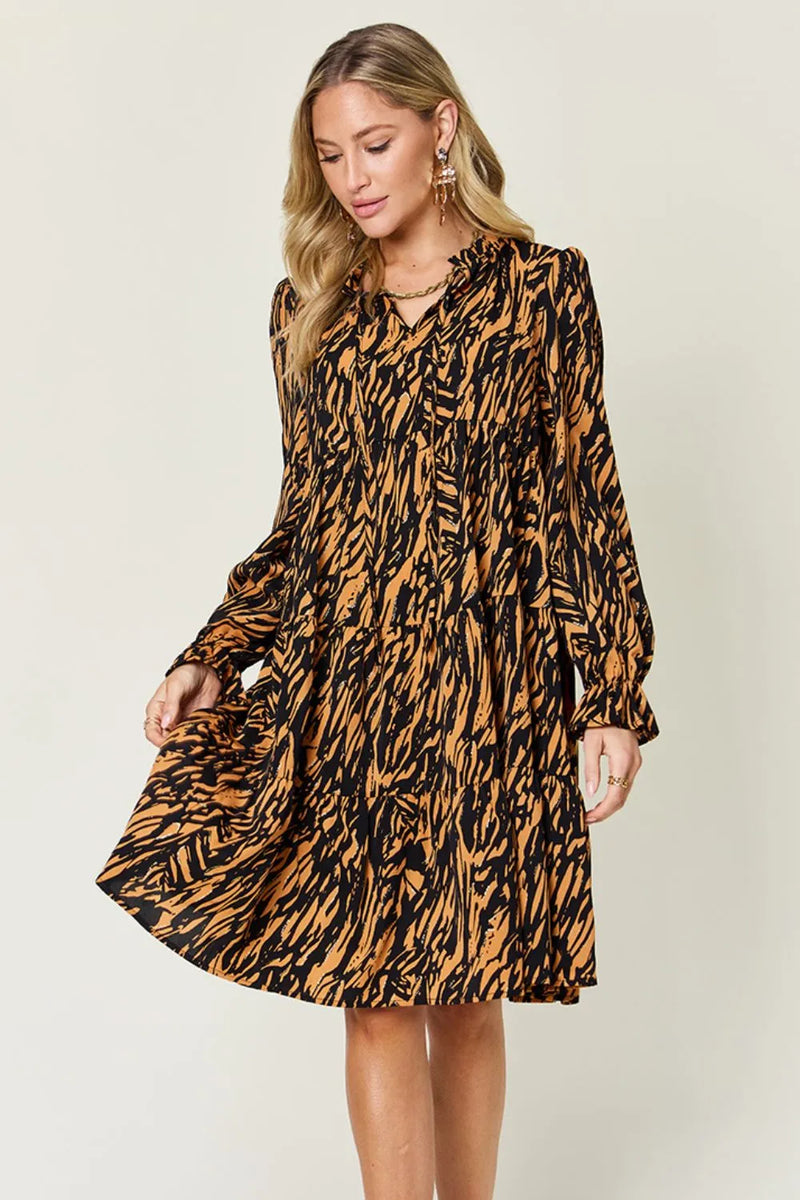 Printed ruffle hem long sleeve dress front view