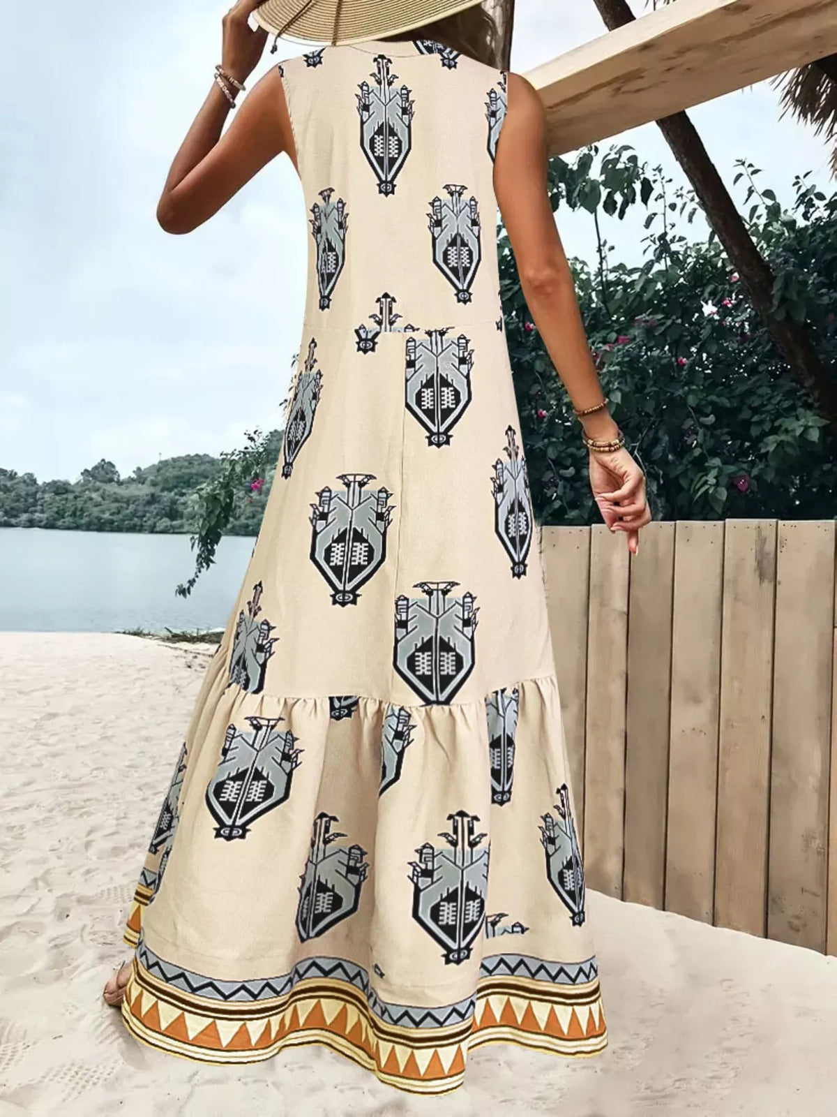 Printed sleeveless tiered maxi dress, back view