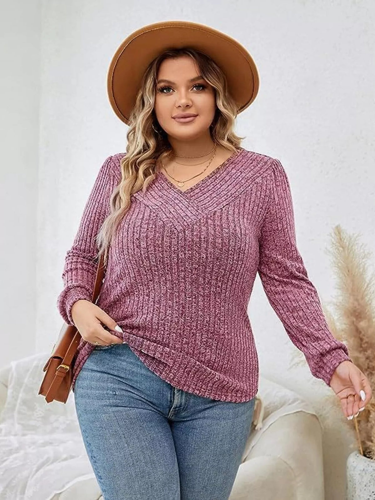 V neck ribbed long sleeve knit top close up of the neckline