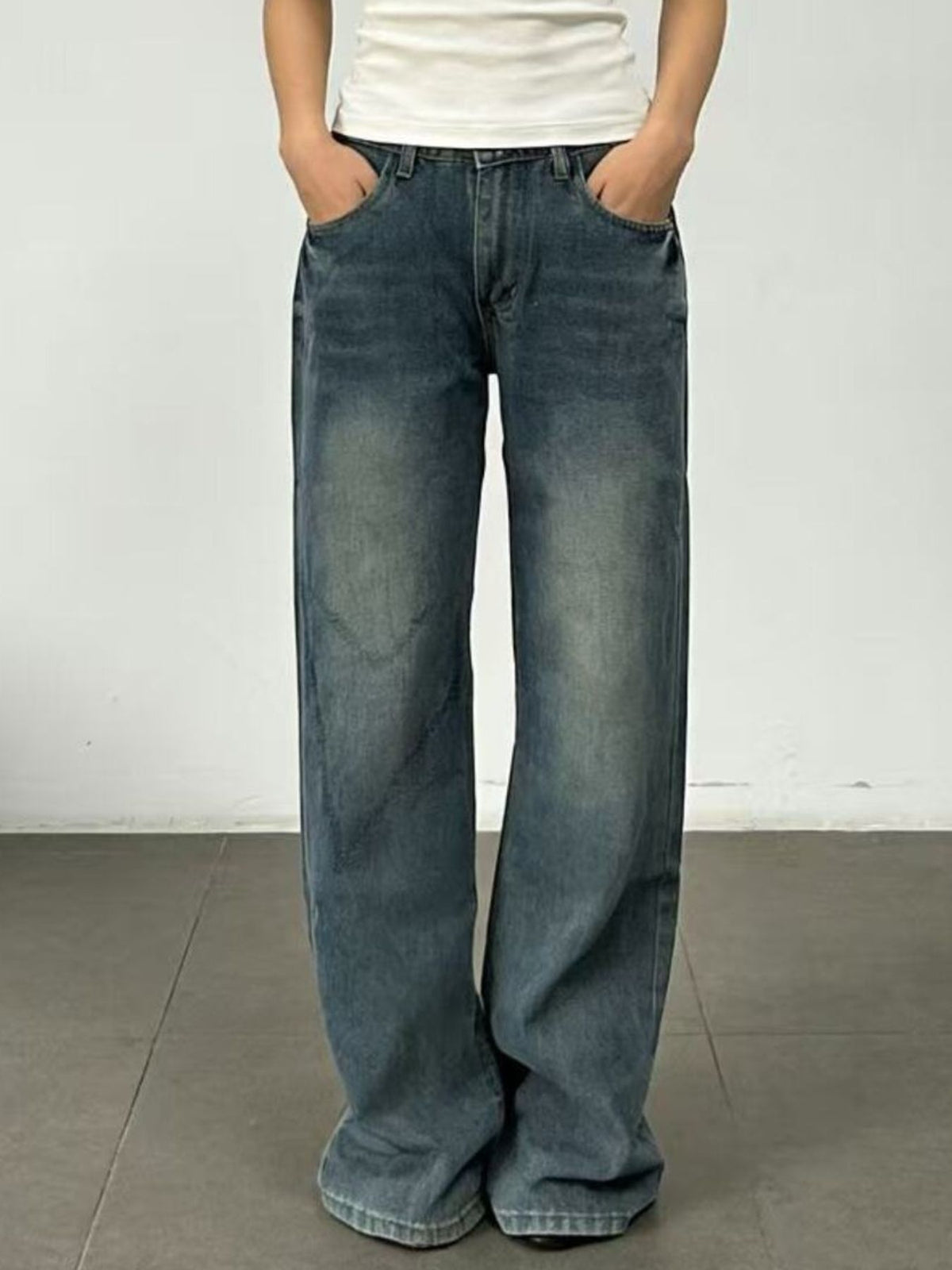 Back view of vintage wash wide leg denim