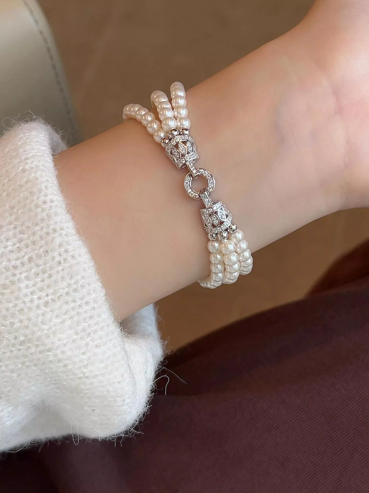 Multi strand pearl bracelet flat lay