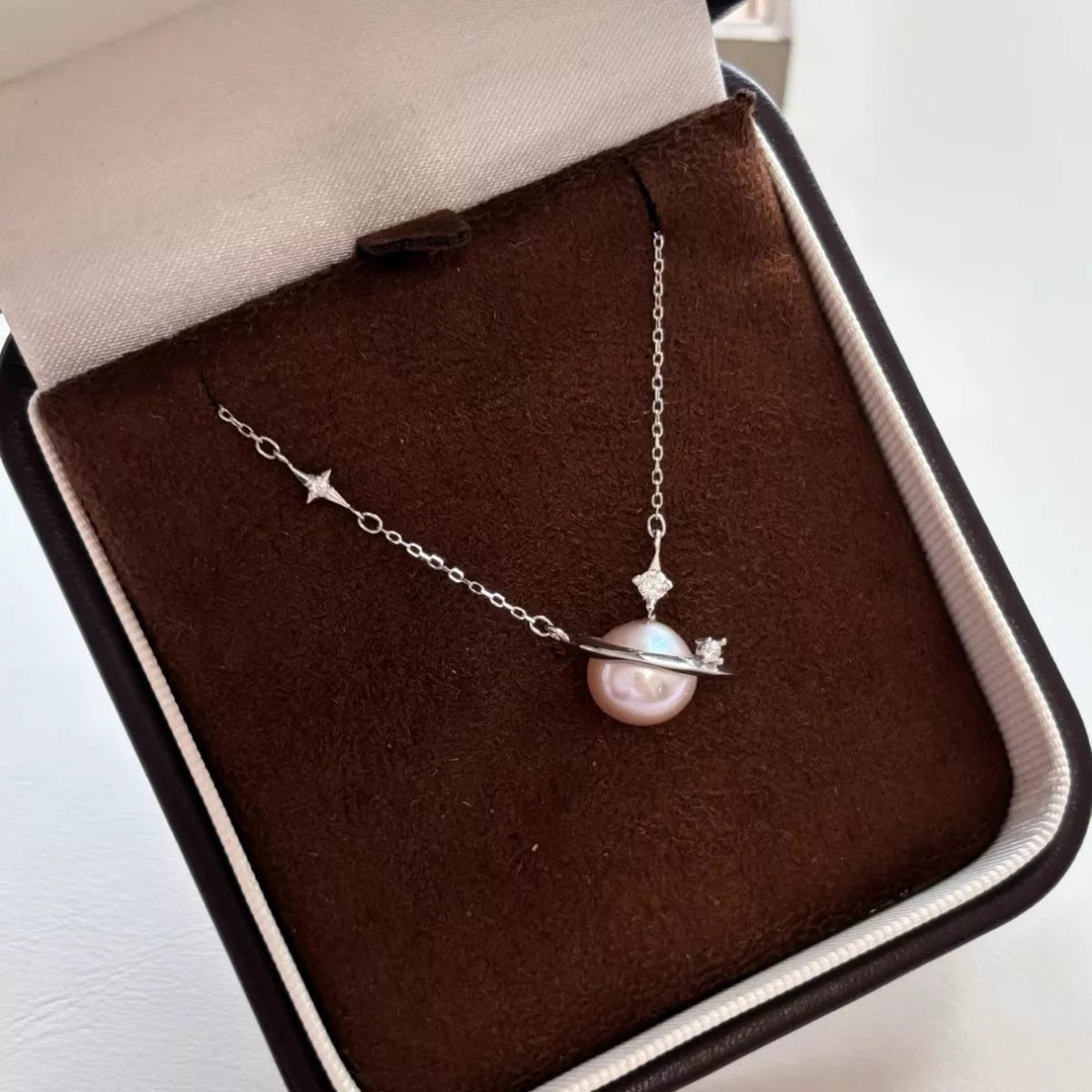 Planet pearl pendant necklace on sterling silver chain styled look
