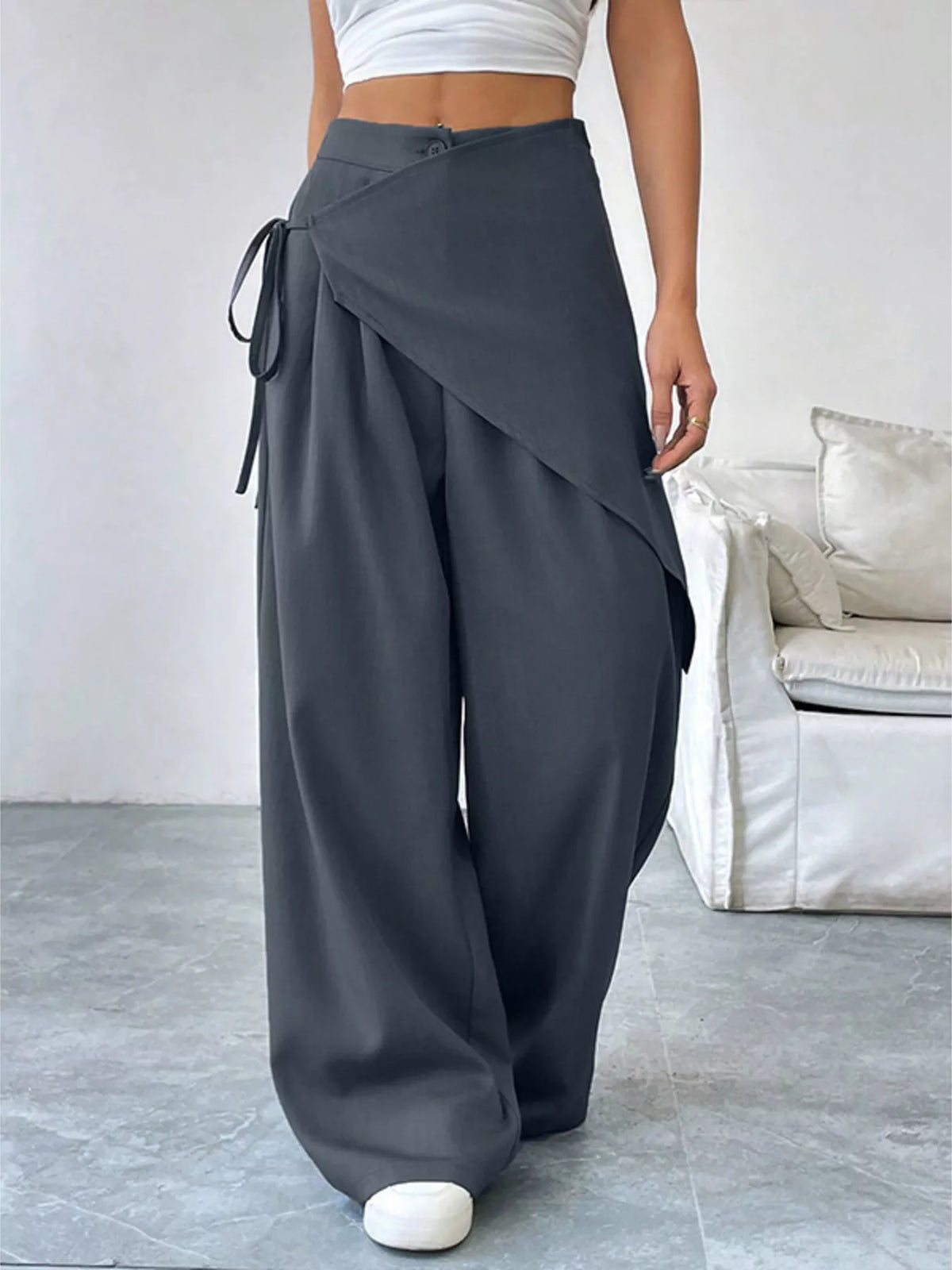 Close up of the asymmetrical wrap front and tie detail