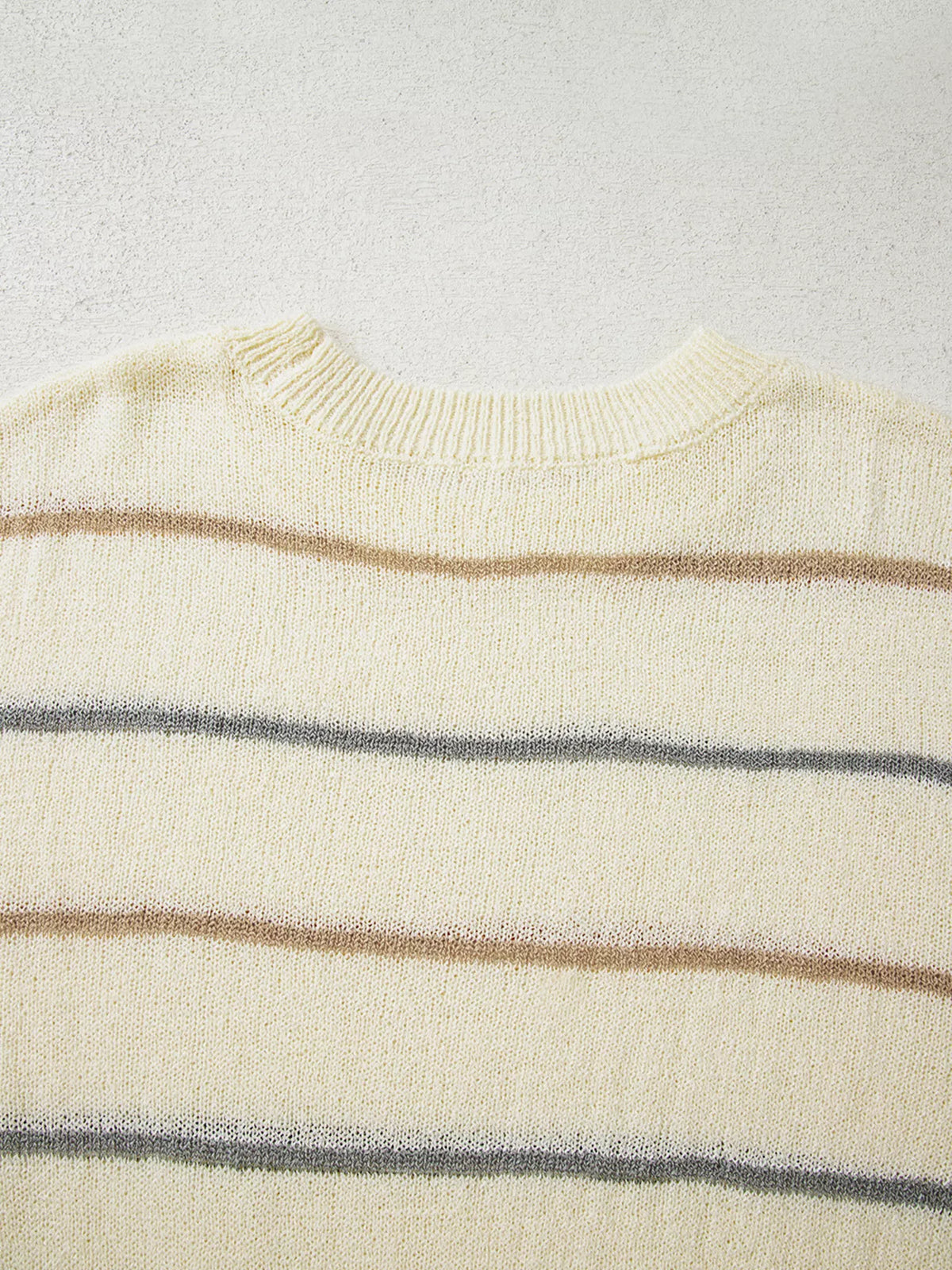Striped ribbed drop shoulder sweater, styled with denim