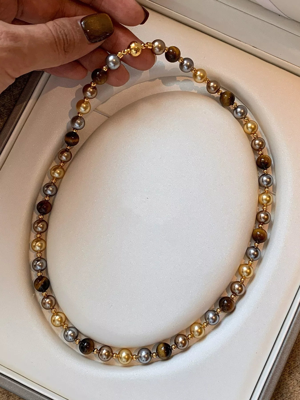 Tiger eye bead and clasp detail