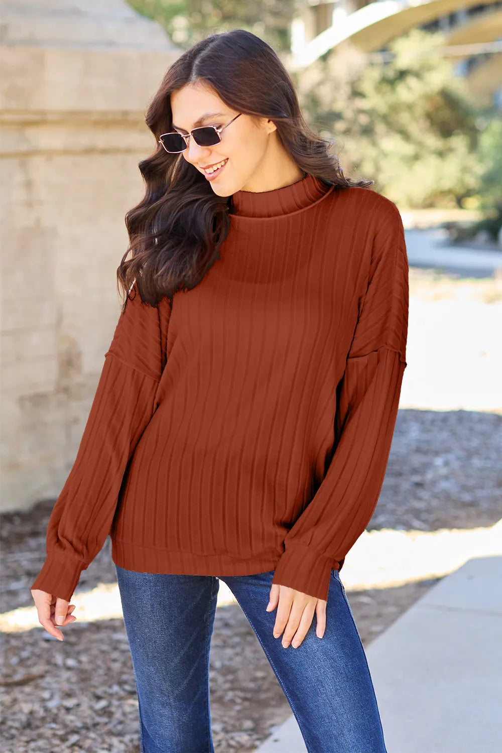 Ribbed mock neck top styled with jeans
