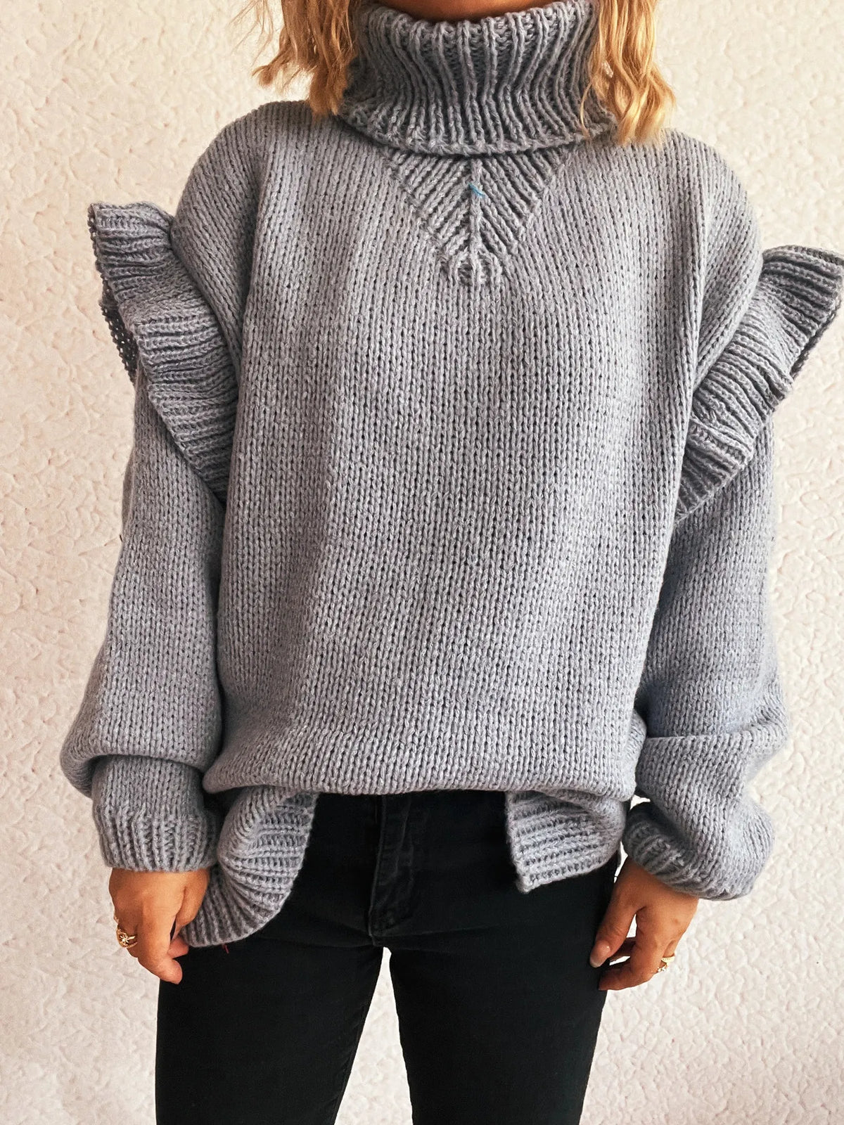 Ruffled turtleneck long sleeve sweater styled look