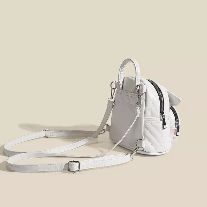 Wings detail mini backpack wing accent close up