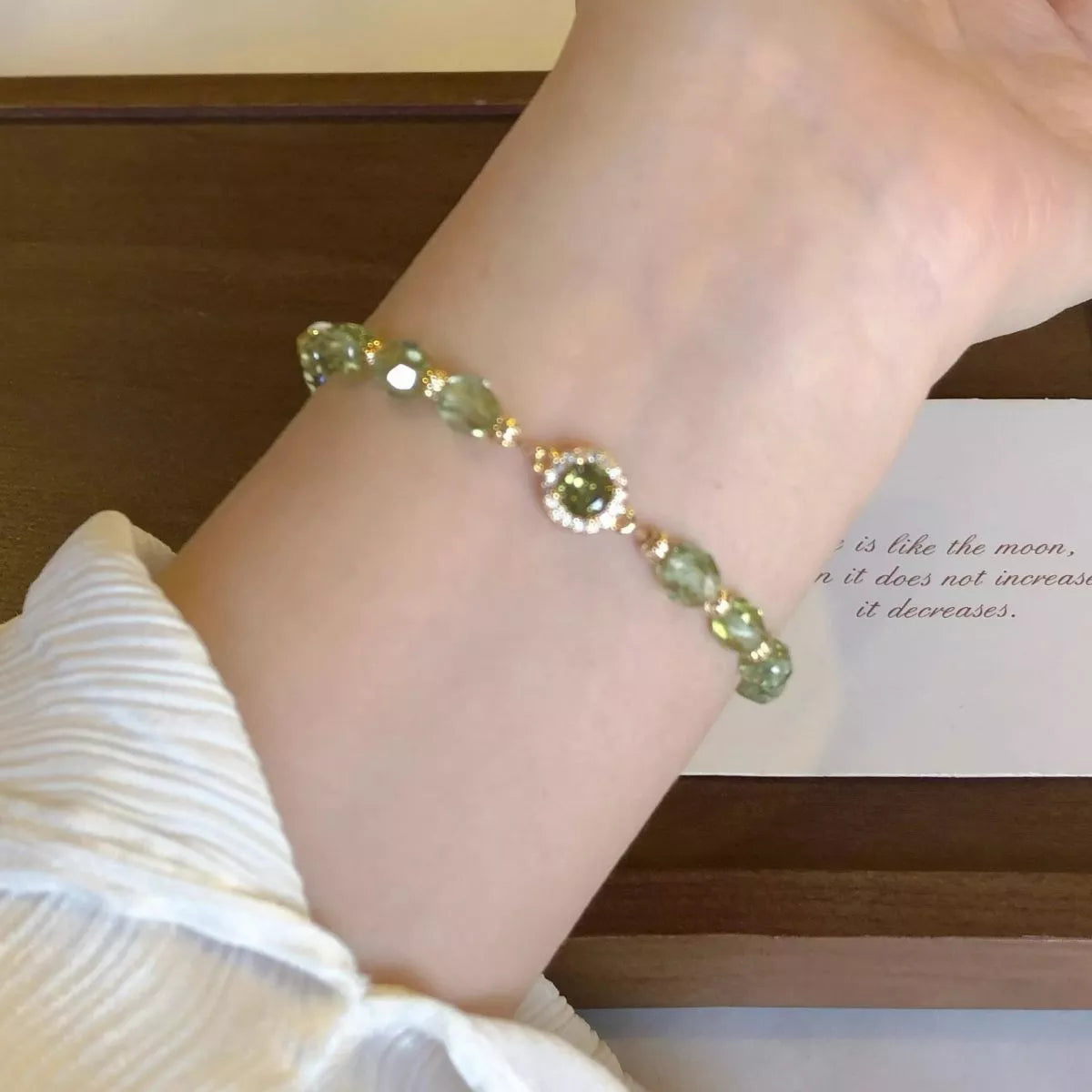 gold plated zircon bead bracelet flat lay