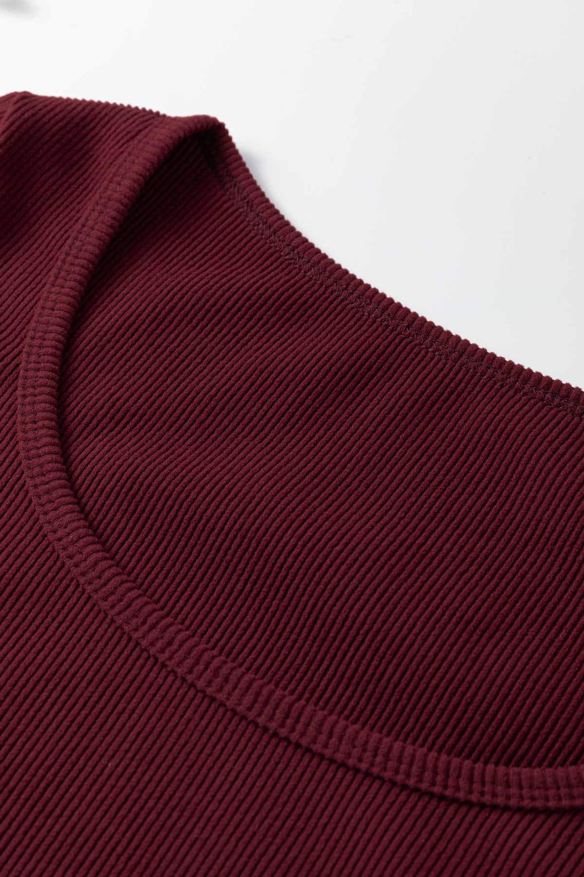 Brown crop top U neckline detail close up
