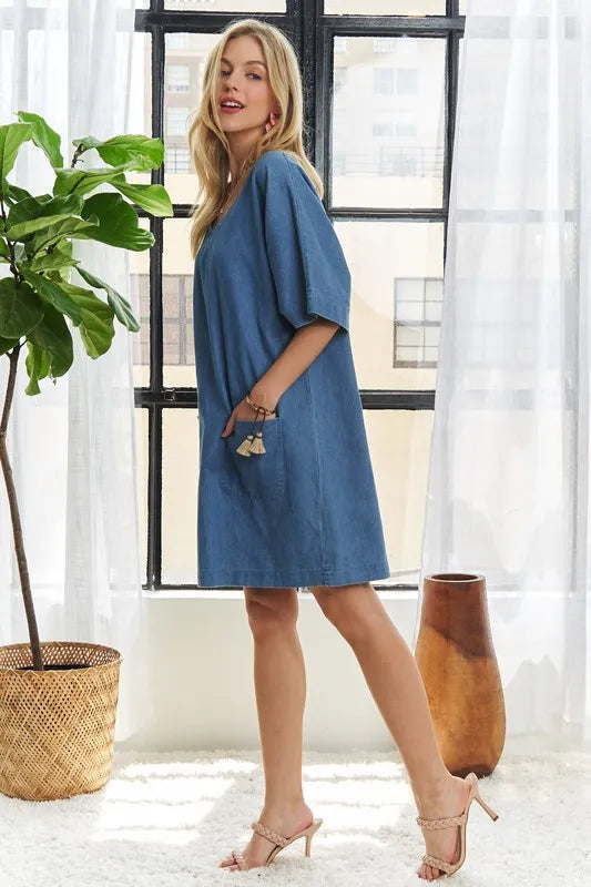 Blue V neck denim mini dress styling detail