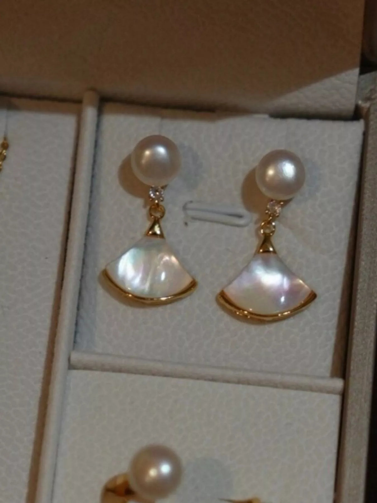 Gold freshwater pearl fan shaped drop earrings