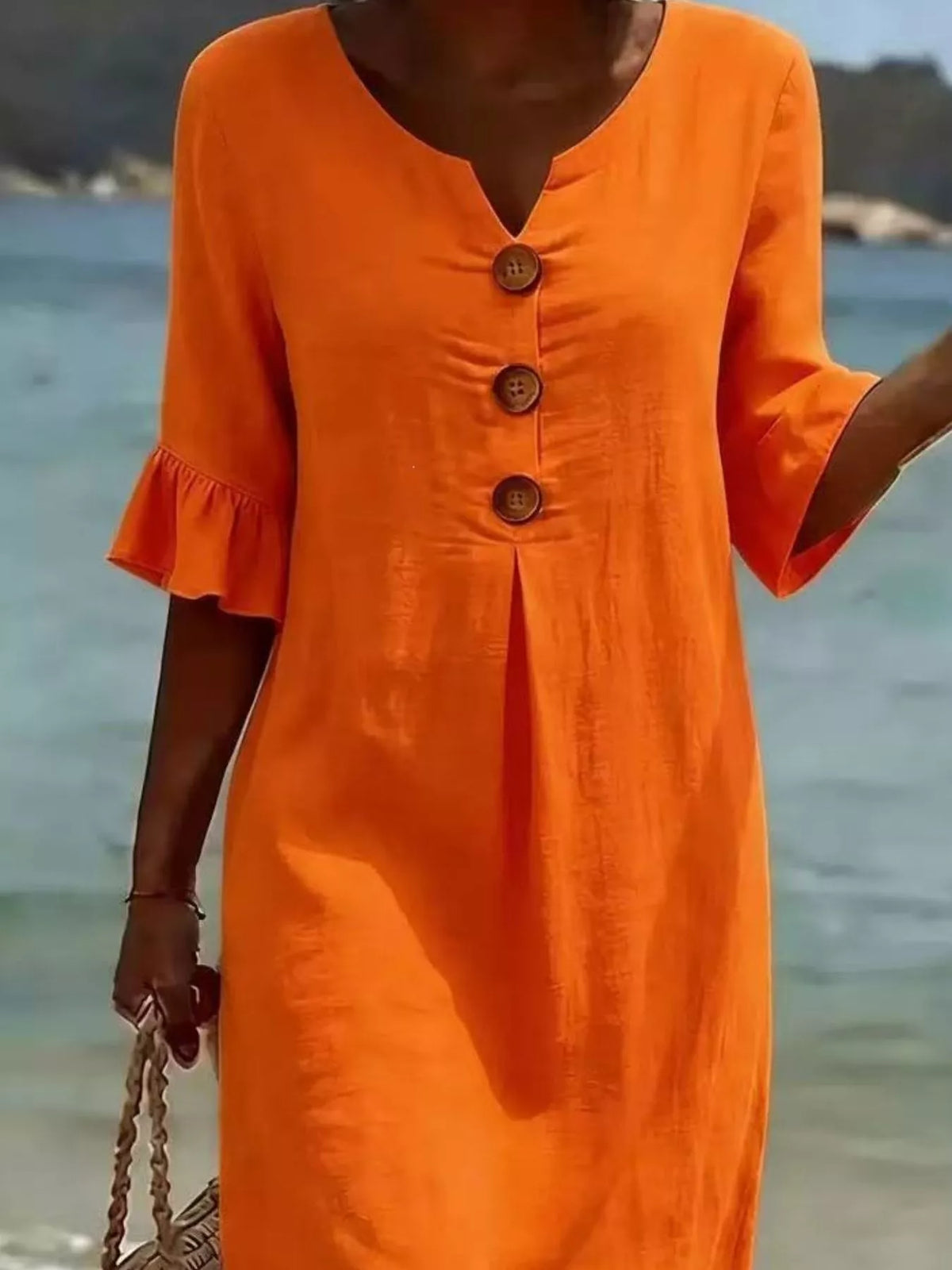 Full length view of the ruffle sleeve midi dress