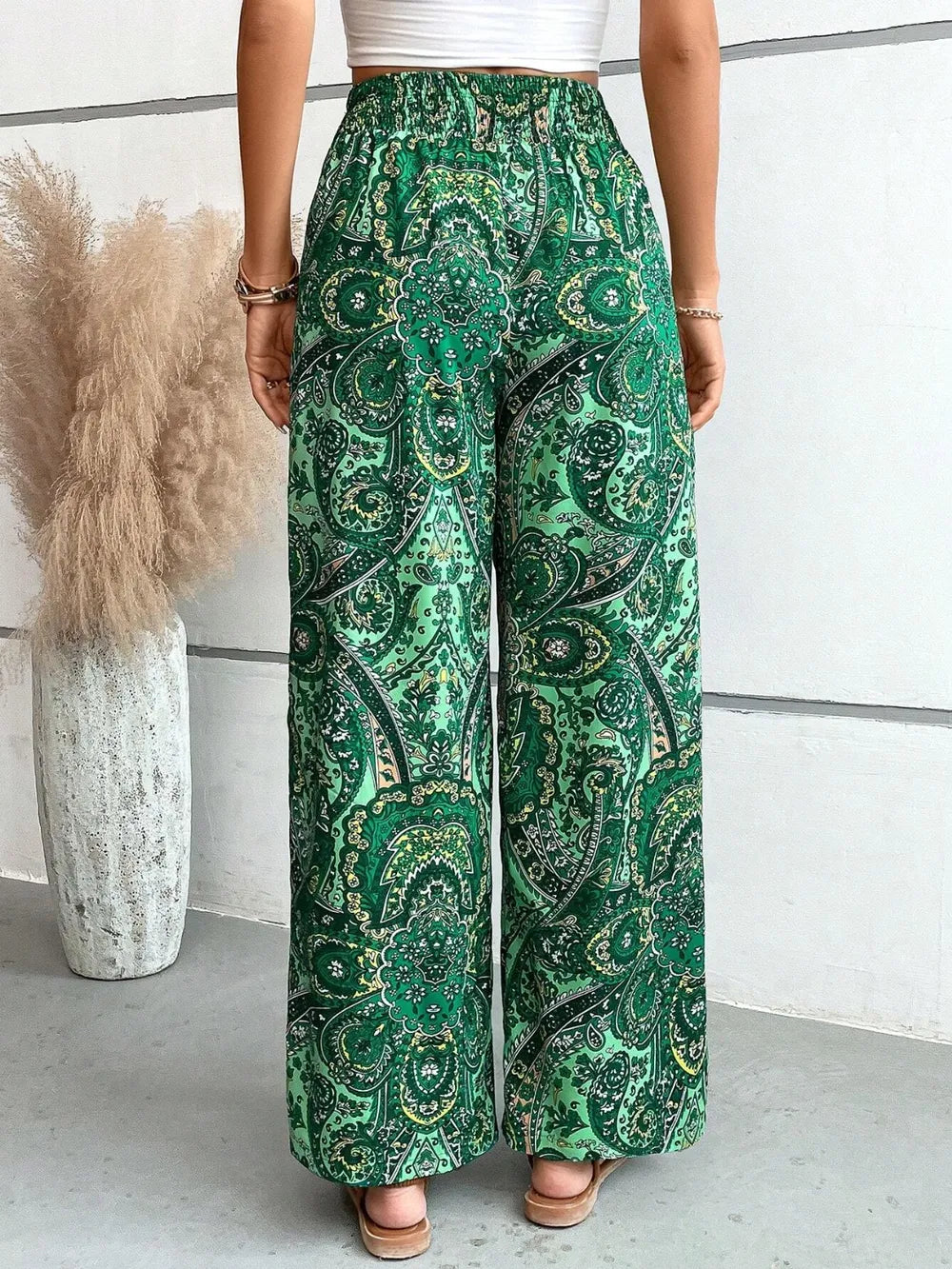 Printed tie waist wide leg pants walking pose