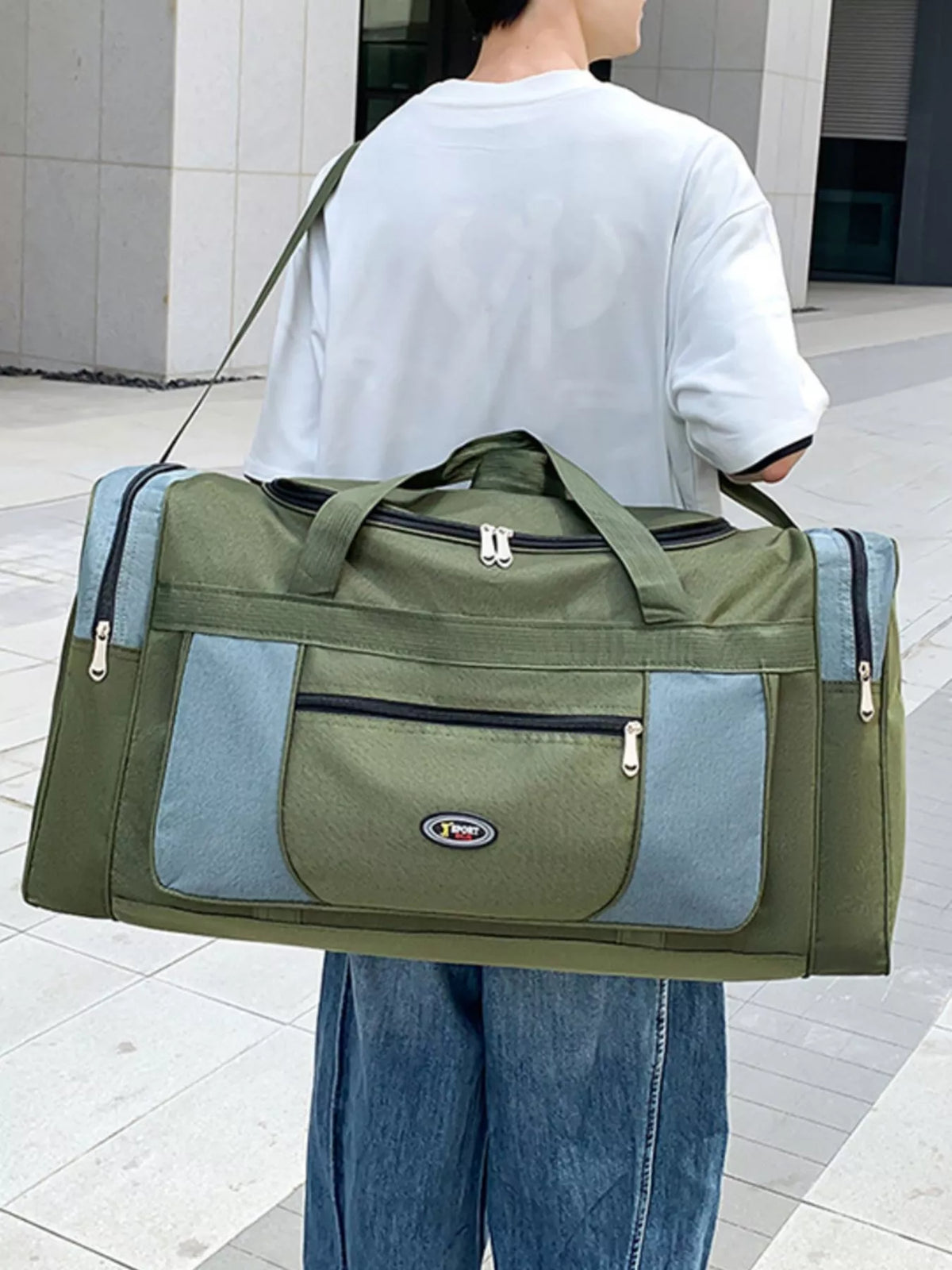Large travel duffel bag handle and zipper detail