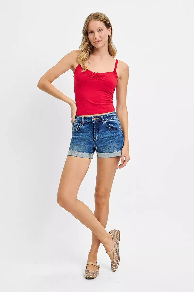 Dark wash denim low rise cuffed shorts front view