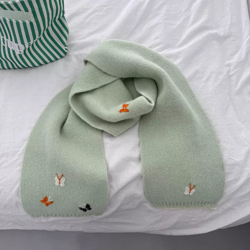 Butterfly knitted scarf draped for a relaxed look