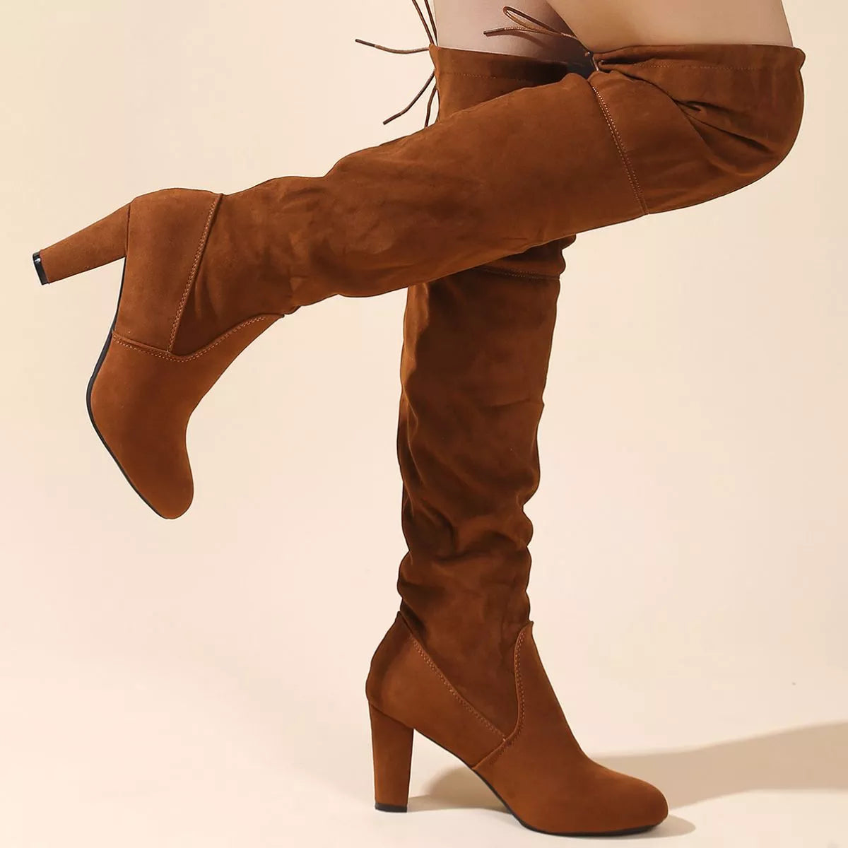 Over the knee high heel suede boots heel detail