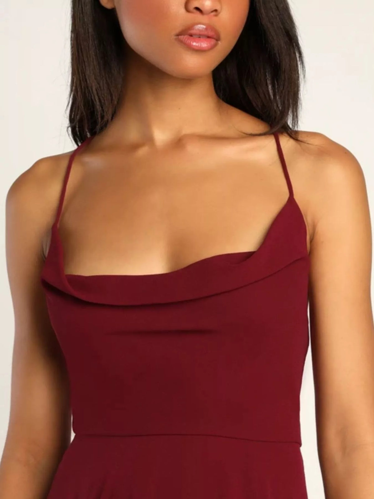 Three quarter view of the cowl neck dress
