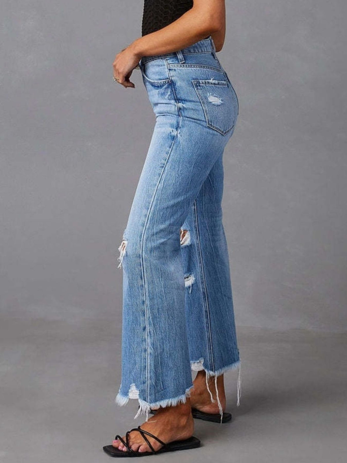 Side view of blue flare denim