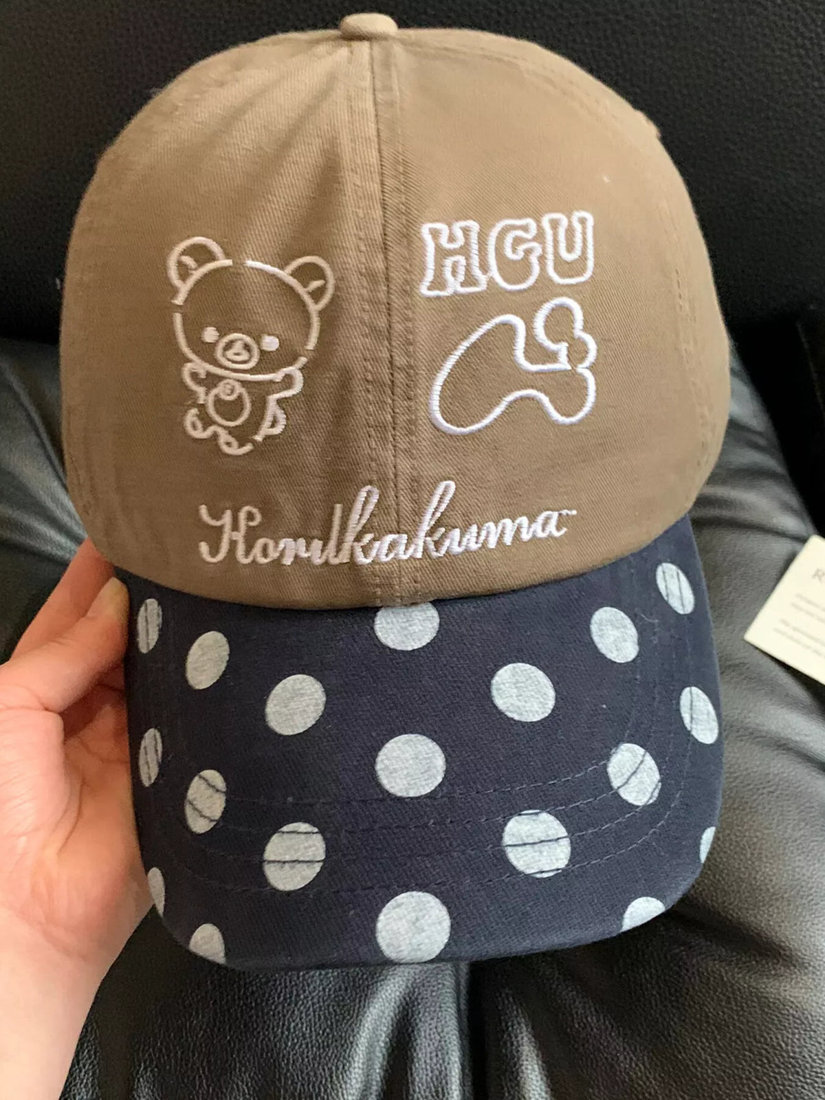 Front view of the polka dot embroidered baseball cap