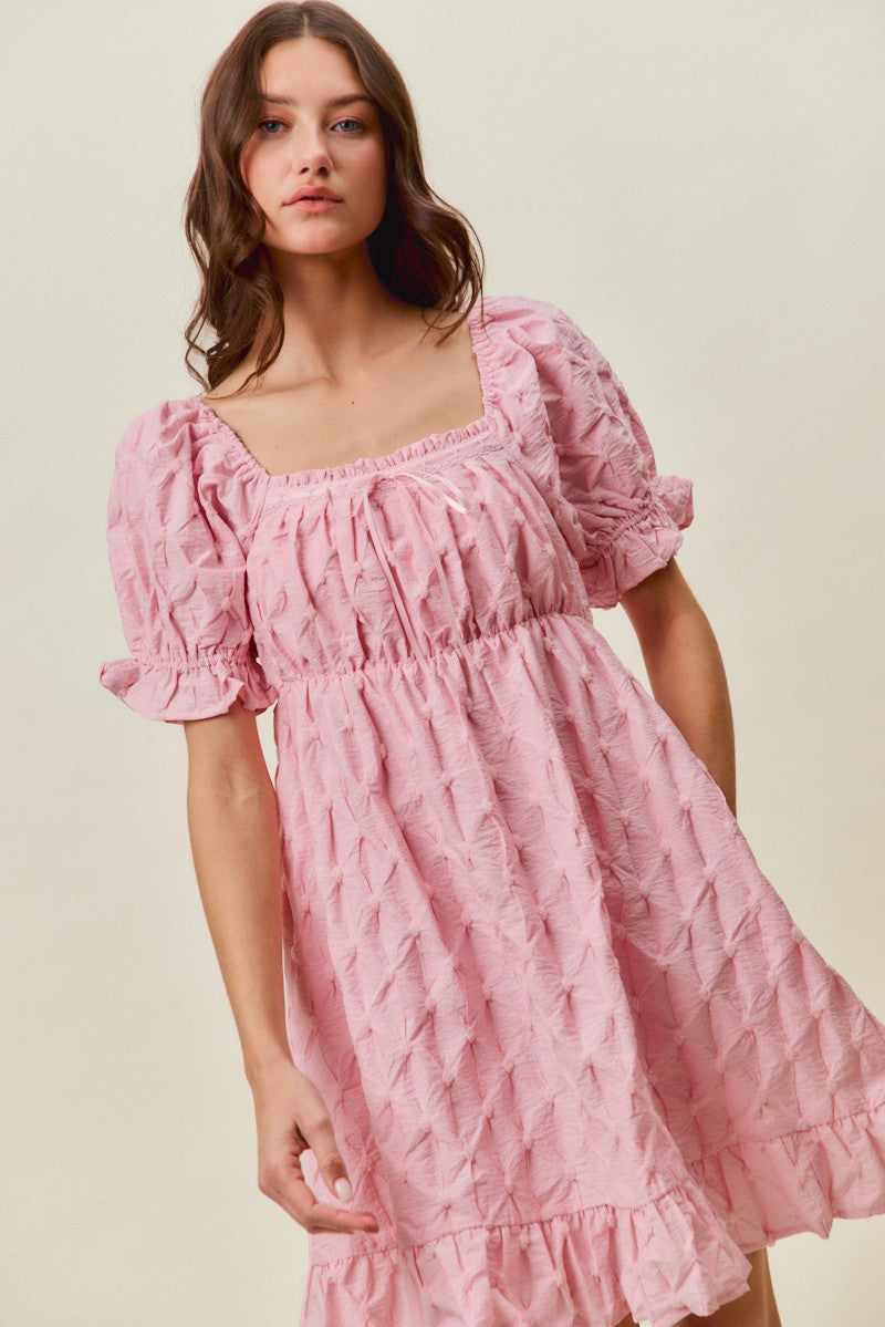 Textured Ruched Bust Mini Dress in Pink on model