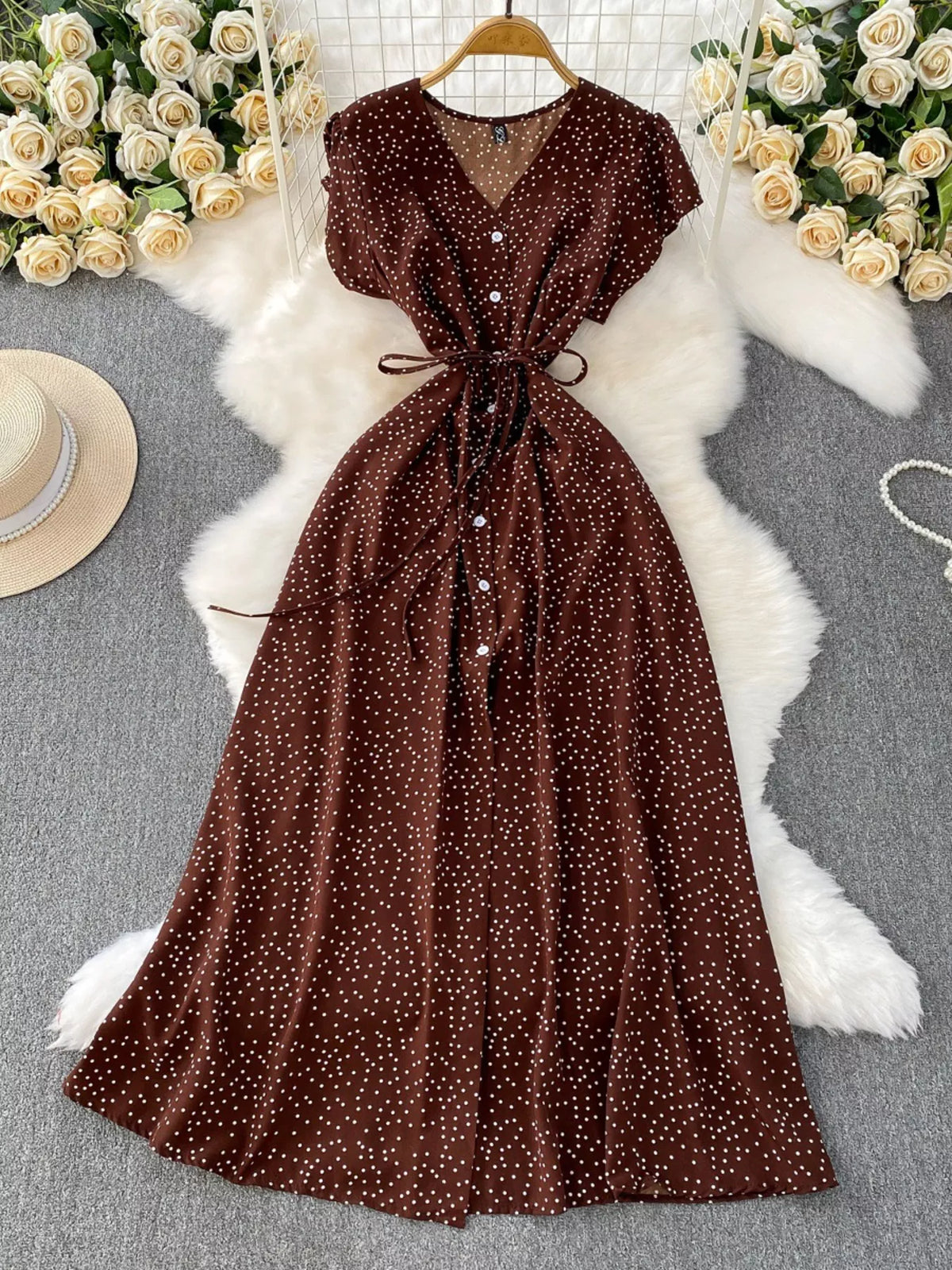 Brown polka dot button up belted maxi dress front view