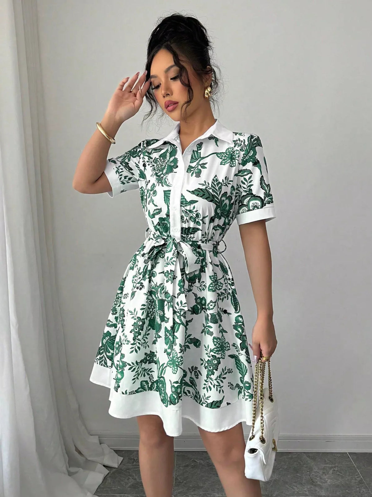 Printed button front belted mini dress close up view