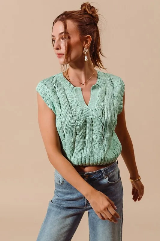 Notched Neck Cable Knit Sweater Vest in Dusty Sage side view