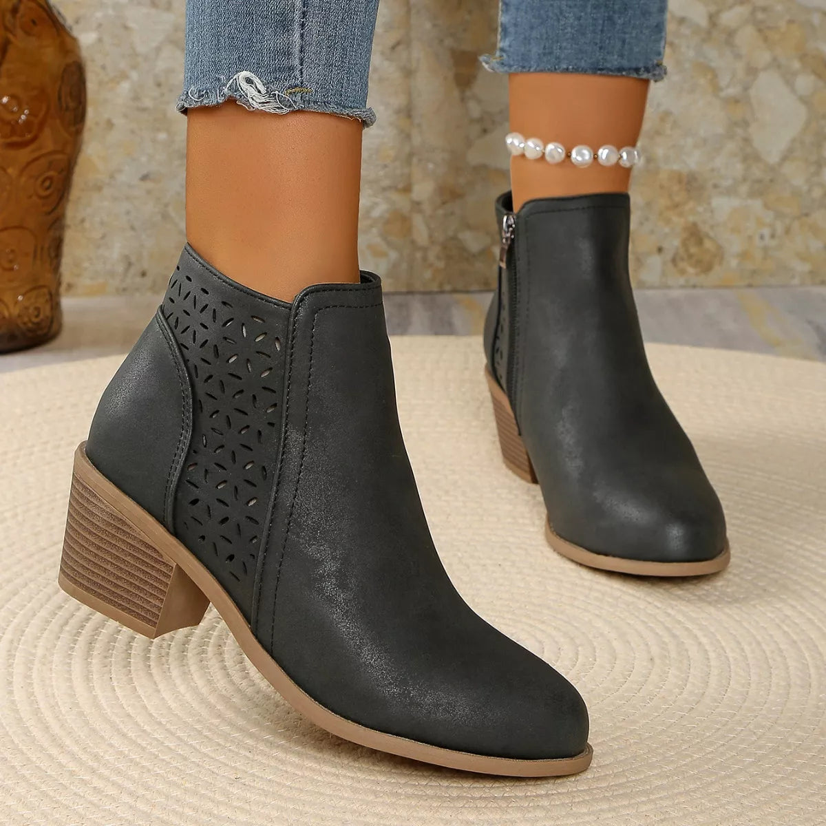 Point toe block heel boots angled three quarter view