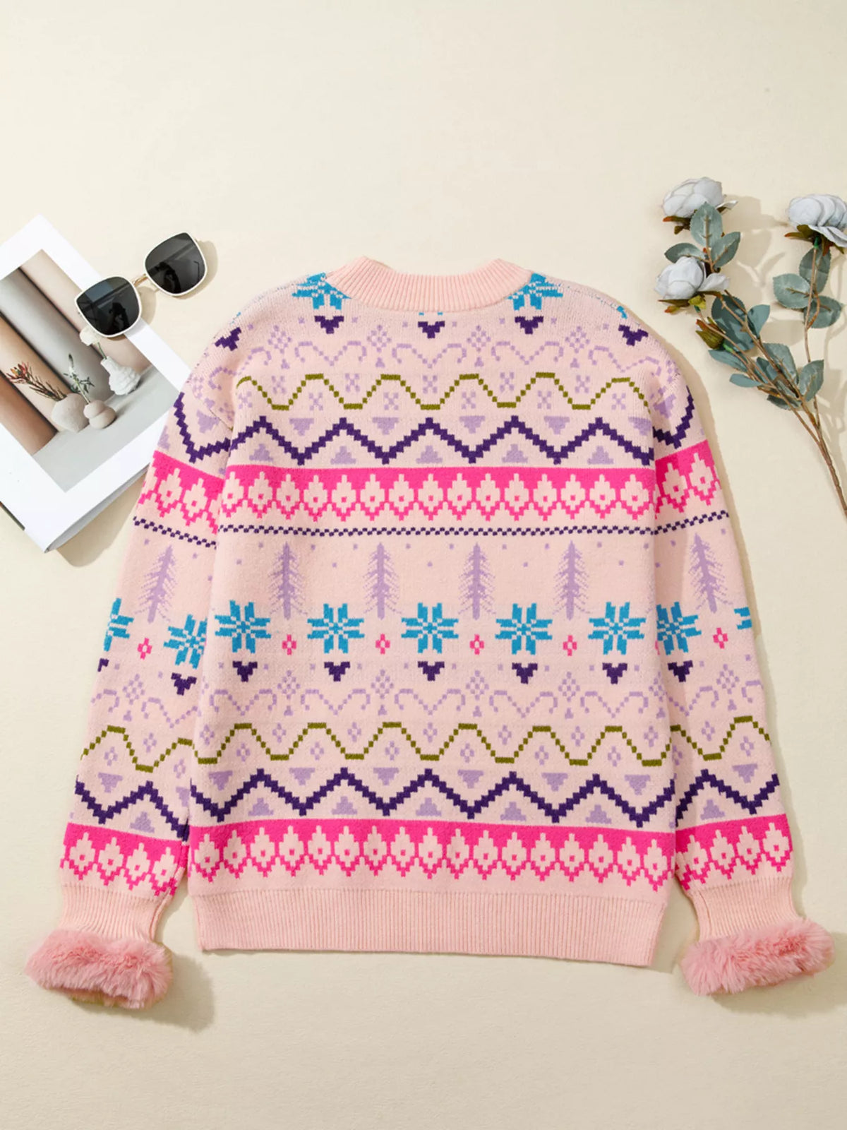 blush pink feather cuff patterned knit sweater back view