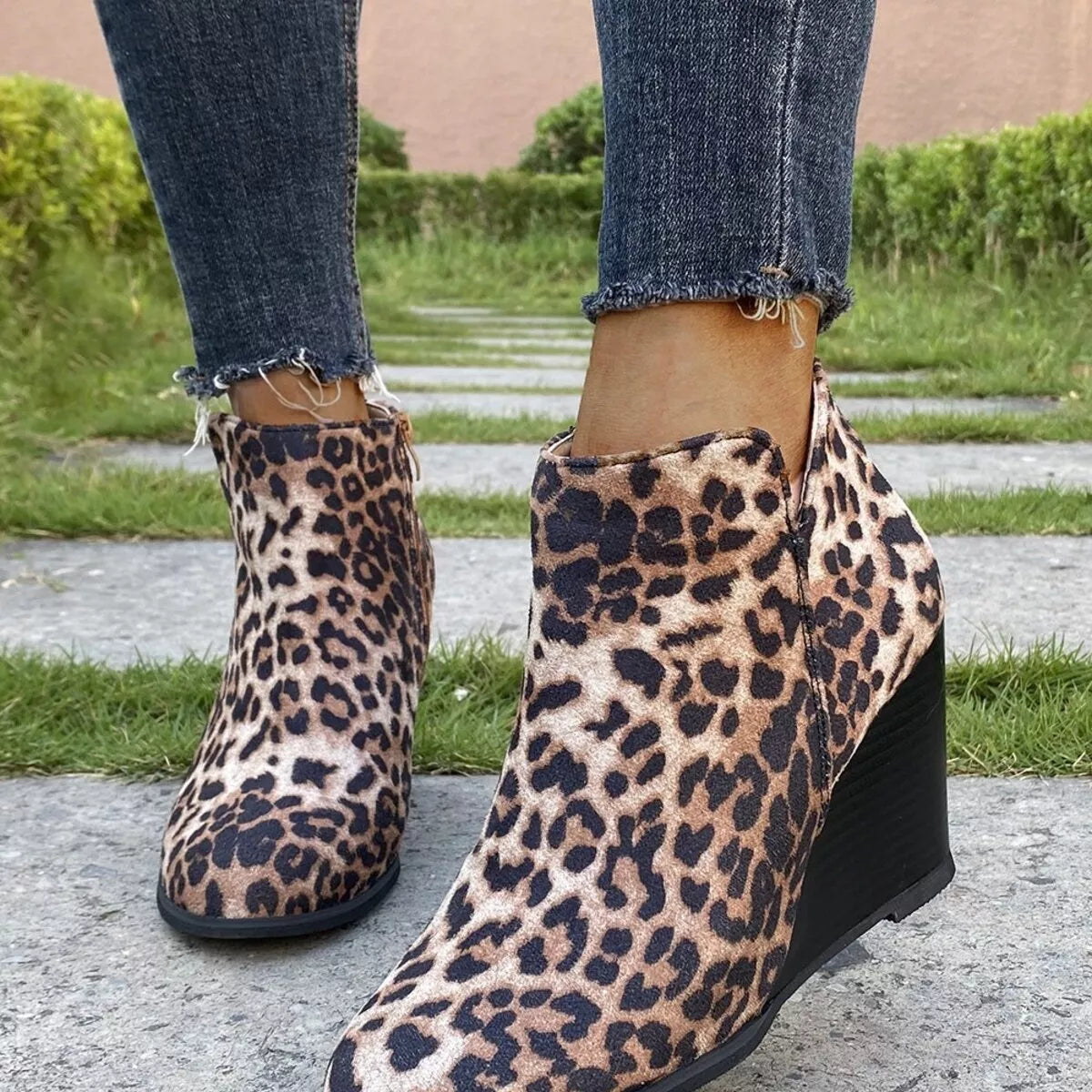 Round toe wedge ankle boots detail of the upper