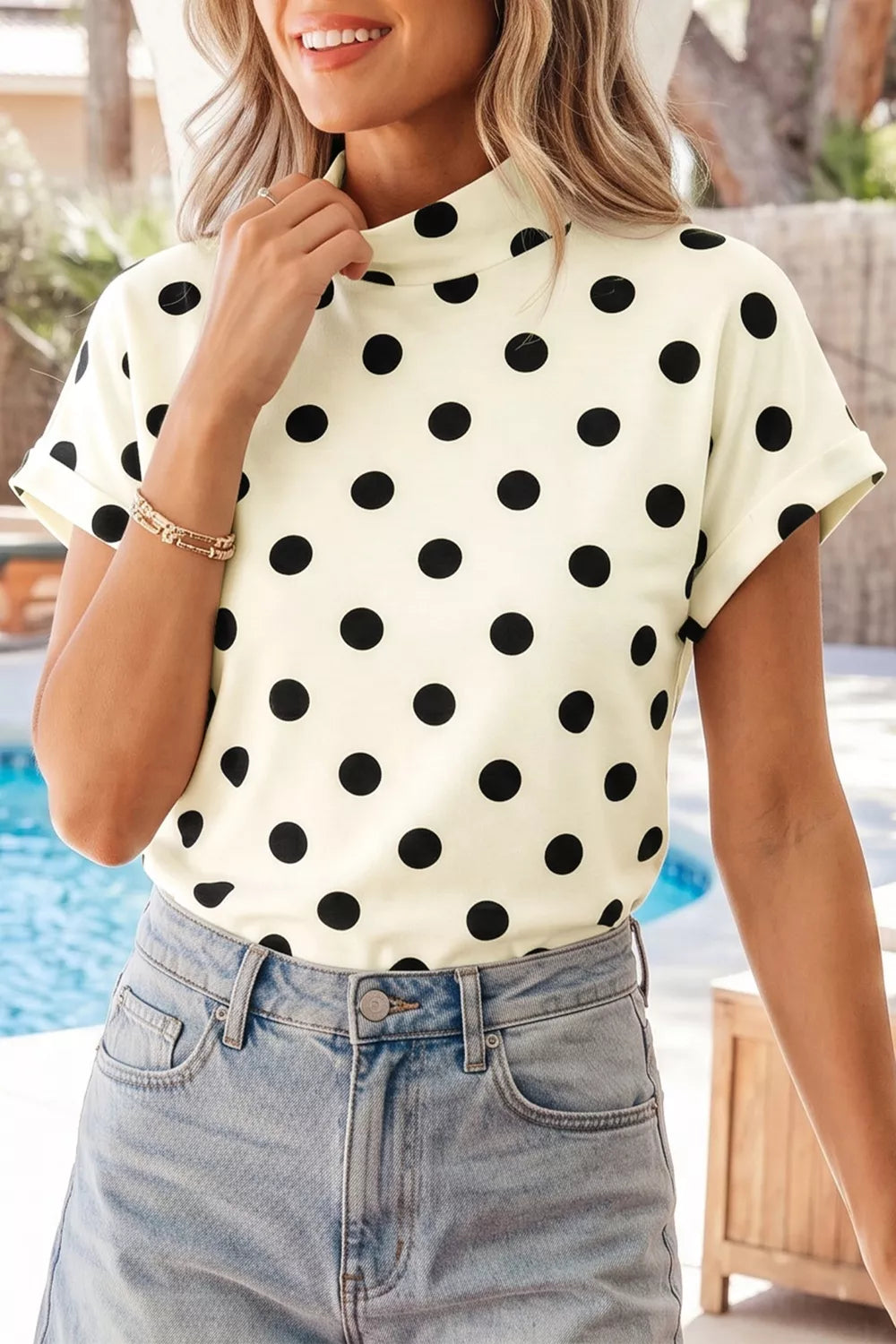 Beige polka dot mock neck blouse front view
