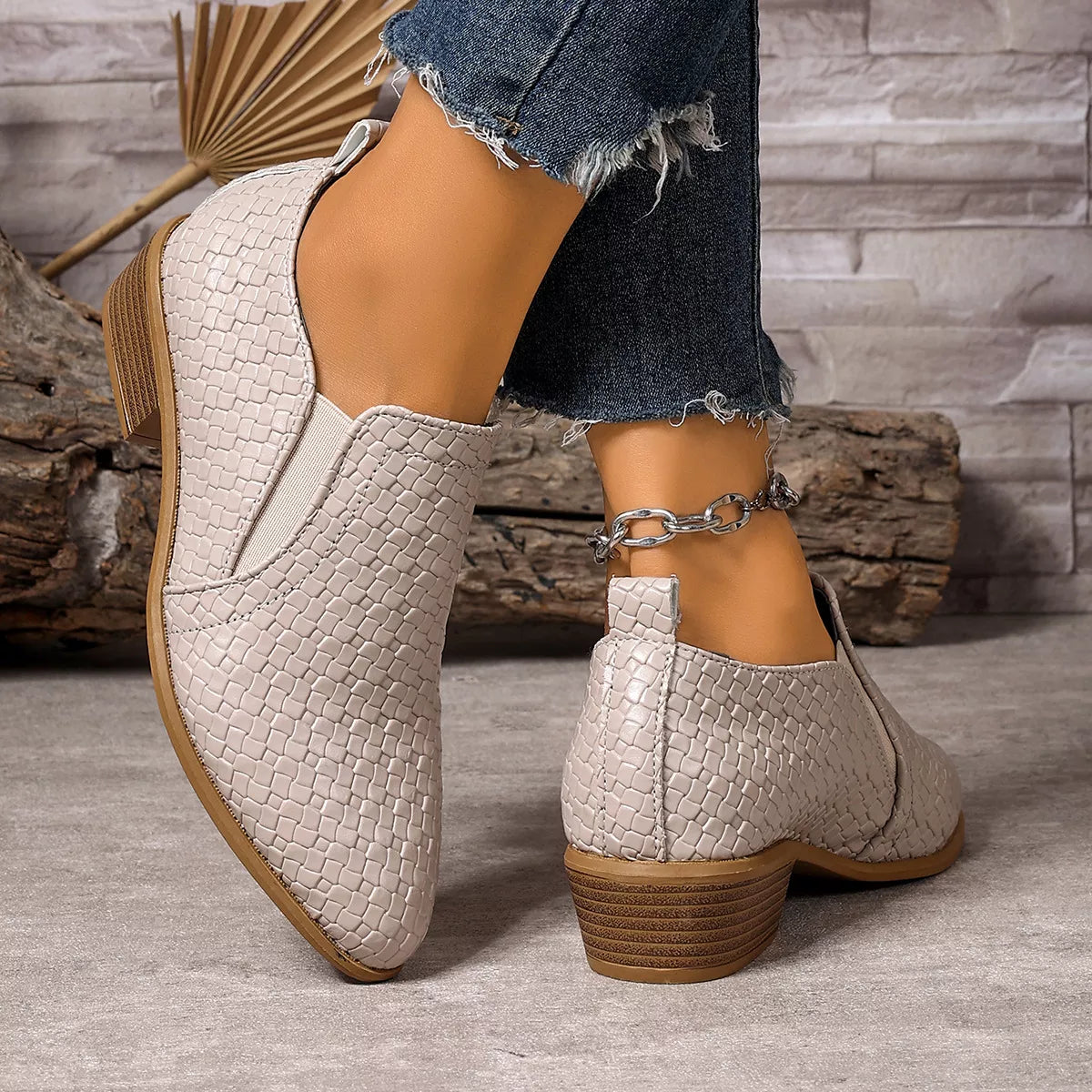 Black point toe block heels ankle boots side profile view