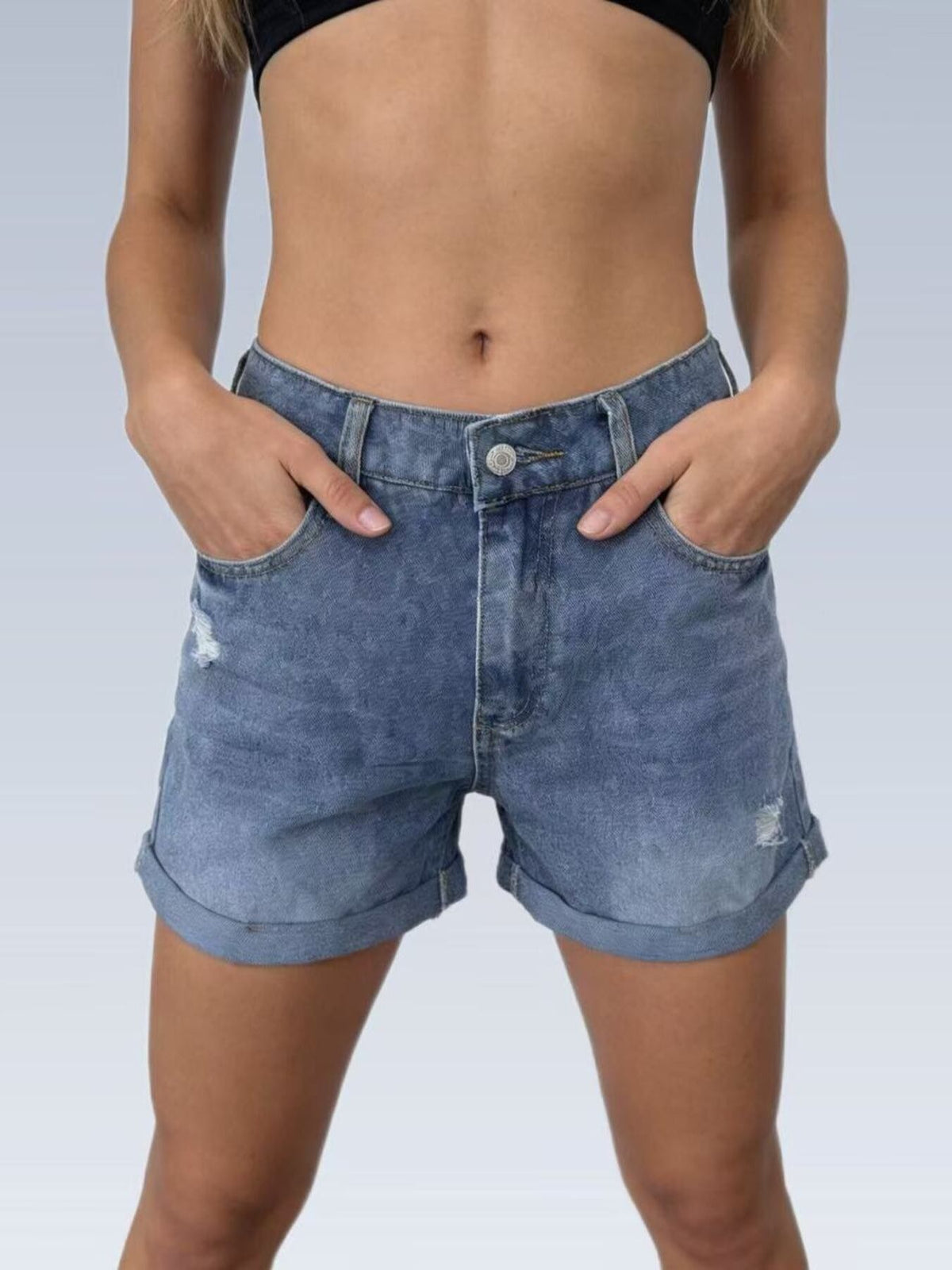 High waisted denim shorts waistband detail