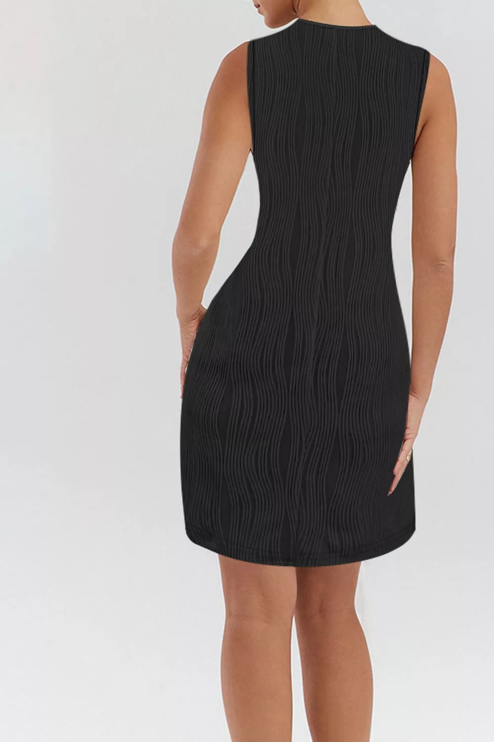 Black sleeveless mini dress back view