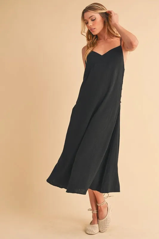 Cami dress side view showing the side buttons