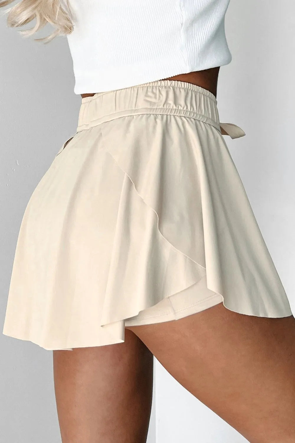 Drawstring high waist lined active skort fabric and stitch detail