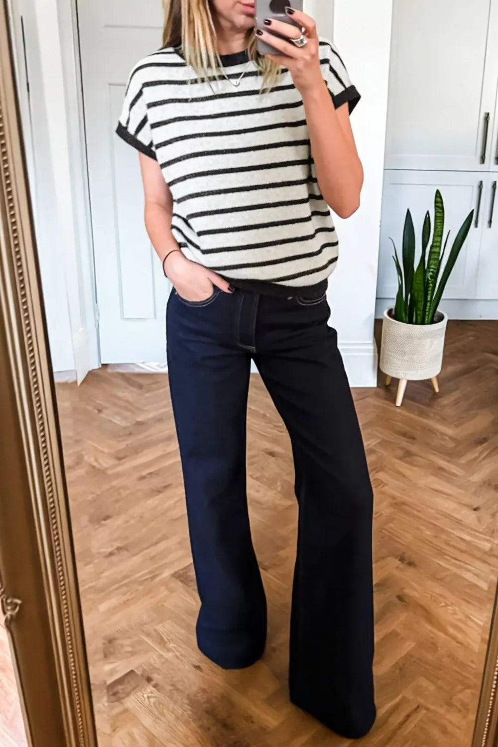 Black short sleeve sweater with bow side view
